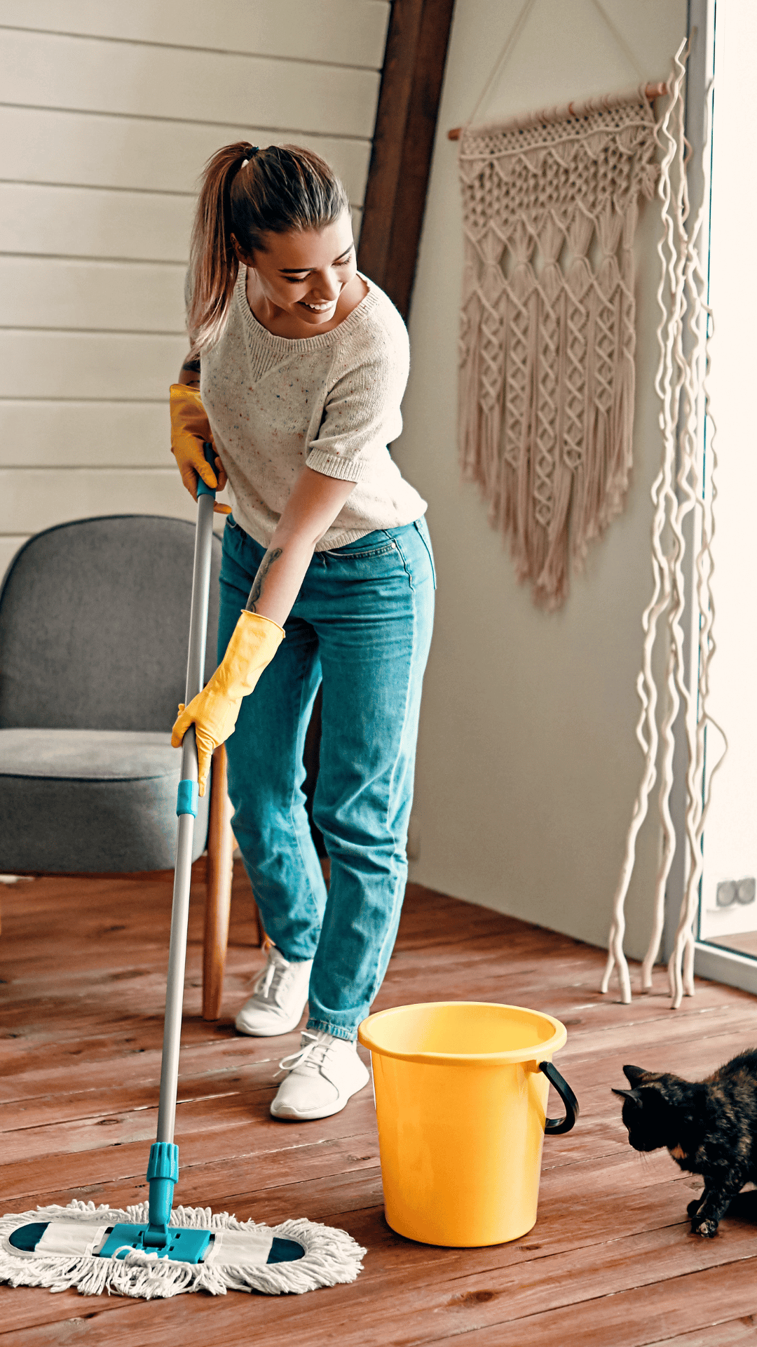 a woman from a cleaning company cleaning a commercial building